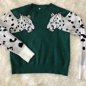 Green snow leopard sweater